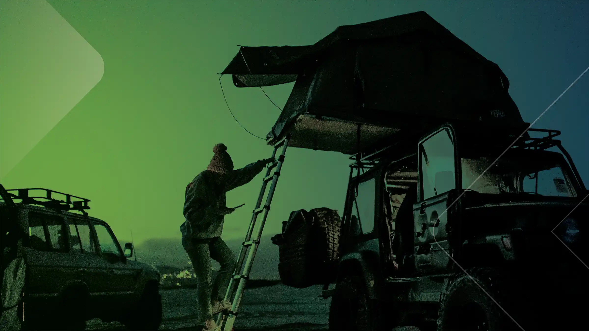A person descending from an suv camper topper