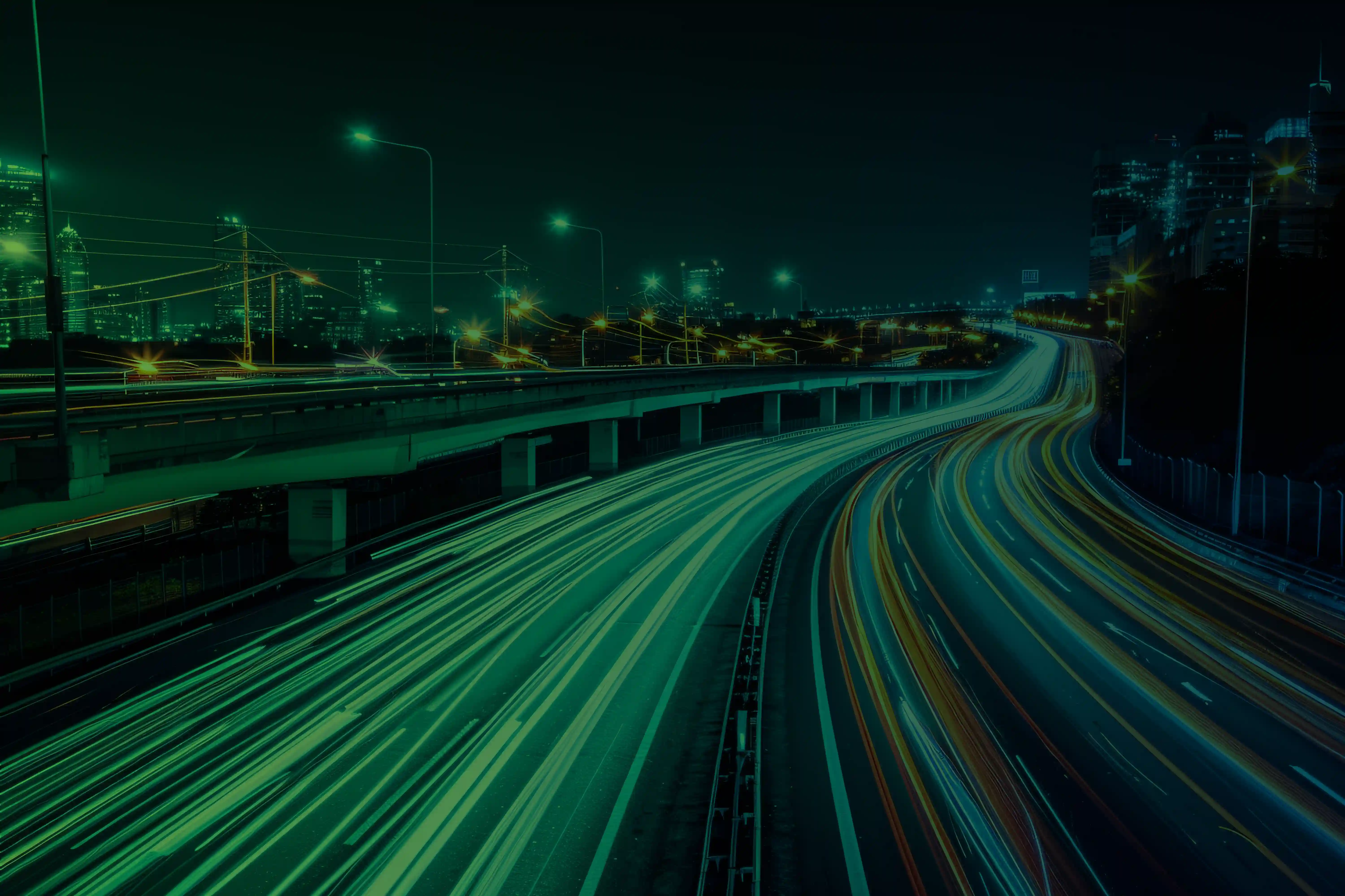 A long-exposure image of cards on a highway